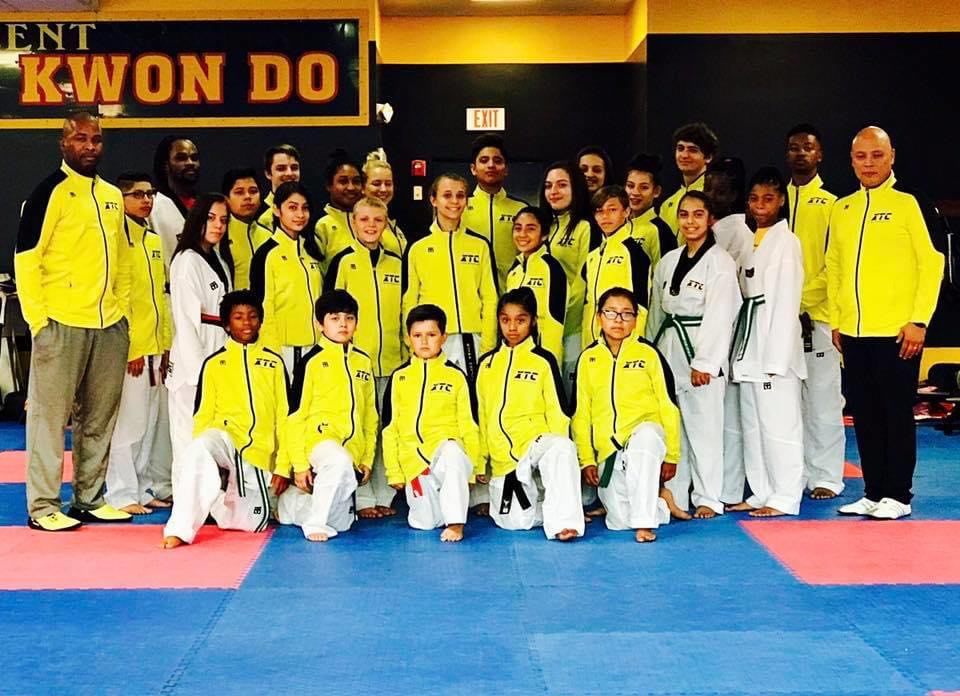 martial arts students in team jackets